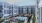 View of the courtyard at The Shipwright in Lynn, MA featuring a central swimming pool, lounge seating, grills, and modern apartment buildings surrounding the amenity space