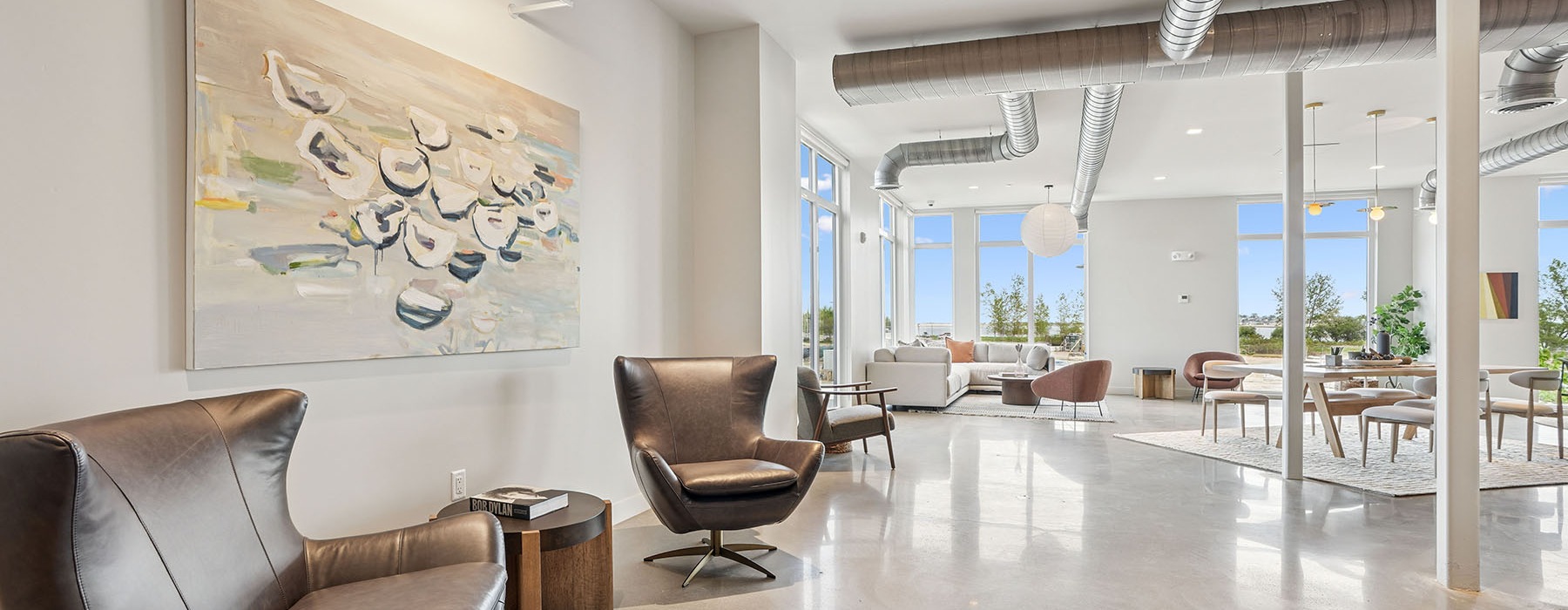 amenities banner showing the coworking lounge at the shipwright apartment