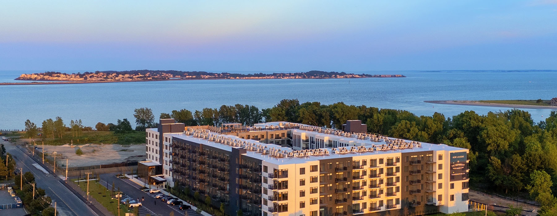 image of the shipwright with harbor park in lynn ma in the background